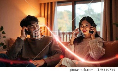 Couple talking on smartphone 126349745