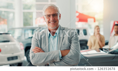 Businessman, portrait and smile with arms crossed for dealership, pride and customer service for car rental. Showroom, mature person and seller with confidence for assistance, vehicle shop and happy Businessman, portrait and smile with arms crossed for dealership, pride and customer service for car rental. Showroom, mature person and seller with confidence for assistance, vehicle shop and happy 126351678