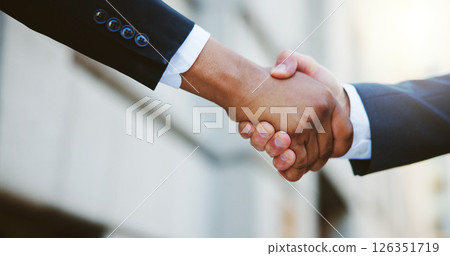 Closeup, business people and men in city, handshake and partnership with b2b deal. Greeting, contract and outdoor with introduction, shaking hands and welcome with agreement, hello and investor Closeup, business people and men in city, handshake and partnership with b2b deal. Greeting, contract and outdoor with introduction, shaking hands and welcome with agreement, hello and investor 126351719