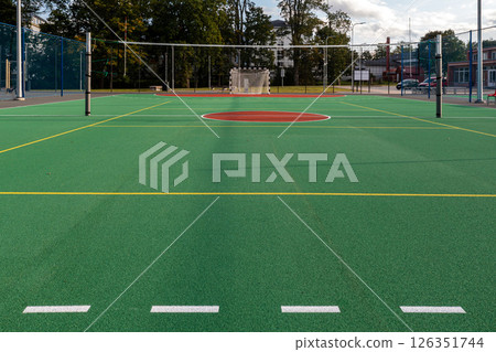 New multi-sport court opened at local park featuring basketball and tennis facilities 126351744