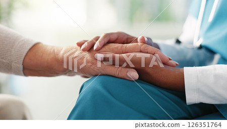 Doctor, holding hands or elderly patient with empathy for comfort, healthcare or consultation at retirement home. Closeup, nurse or caregiver with touch for support, assisted living or sympathy 126351764