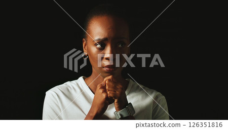 Thinking, depression and black woman with anxiety in studio, fear and mental health on background space. Pensive, stress and person worry for psychological trauma, crisis or abuse victim with regret Thinking, depression and black woman with anxiety in studio, fear and mental health on background space. Pensive, stress and person worry for psychological trauma, crisis or abuse victim with regret 126351816