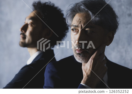 A businessman looking at a distance A businessman looking at a distance 126352252