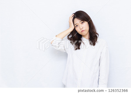 A woman with a headache A woman with a headache 126352366