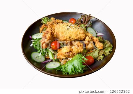 Crispy deep-fried soft shell crab salad with vegetables on ceramic plate 126352562