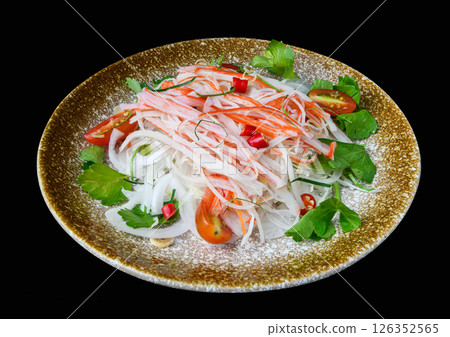 Spicy kani crab salad with onions, tomato, and coriander 126352565