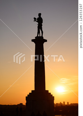 Silhouette of Victor monument, with sunset sky in the background, at Belgrade fortress Kalemegdan in Belgrade, Serbia Silhouette of Victor monument, with sunset sky in the background, at Belgrade fortress Kalemegdan in Belgrade, Serbia 126353197