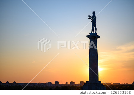 Silhouette of Victor monument, with sunset sky in the background, at Belgrade fortress Kalemegdan in Belgrade, Serbia Silhouette of Victor monument, with sunset sky in the background, at Belgrade fortress Kalemegdan in Belgrade, Serbia 126353198