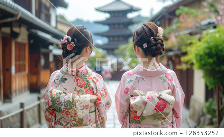 A young woman in a kimono strolling through the ancient city A young woman in a kimono strolling through the ancient city 126353252