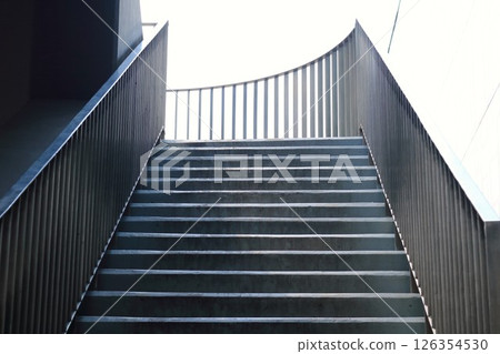 Steel stairs with light and shadow in evening 126354530