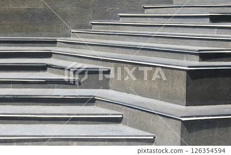 Modern concrete stairs in the garden. Gray concrete stairs modern design in the garden 126354594