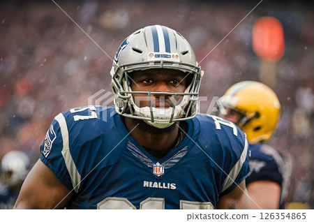 composite image of american football player wearing helmet 126354865