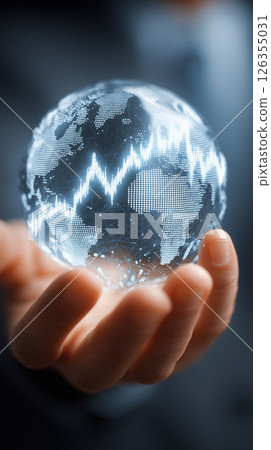 Businessman hand holding glass globe with digital graph, global finance and technology concept Businessman hand holding glass globe with digital graph, global finance and technology concept 126355031