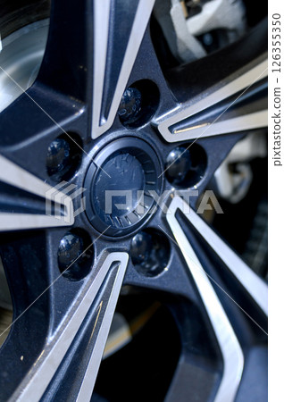 Car wheel with brake calipers and stylish design. Car wheel with brake calipers and stylish design. 126355350