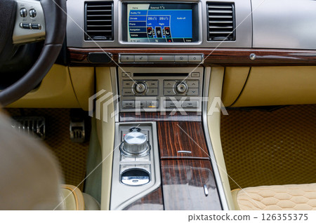 Car interior - steering wheel, shift lever and dashboard. Car inside. 126355375