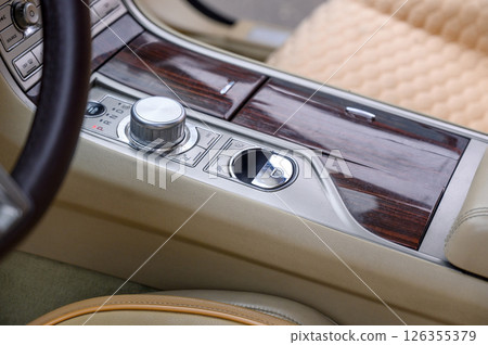 Automatic transmission selector in the interior of a modern car. 126355379