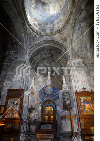 Interior of the Gergeti Trinity Church near Stepantsminda, popular tourist destination in the Caucasus in Georgia 126356163