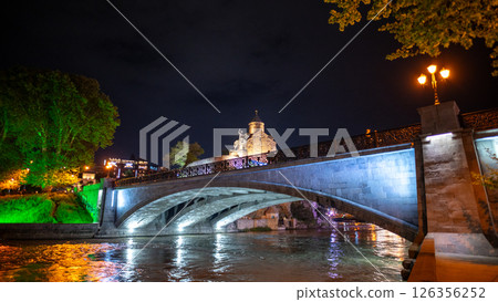 Night view of Metekhi church and King Vakhtang Gorgasali monument above Mtkvari river in Tbilisi, Georgia 126356252