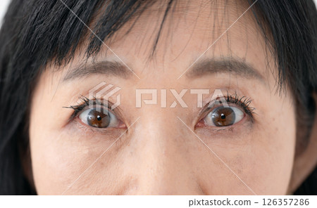 Senior woman eyes Senior woman eyes 126357286