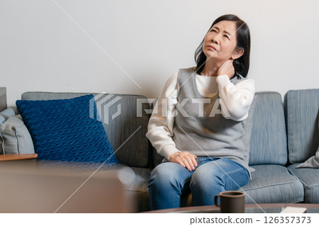 Stiff shoulders Senior woman 126357373