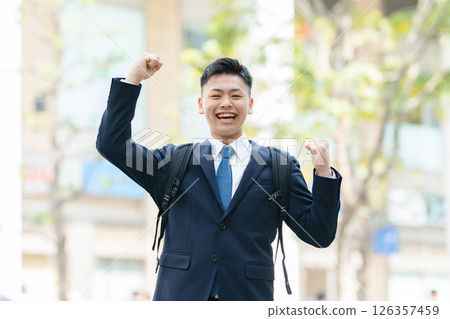 Young male business fist pump Young male business fist pump 126357459