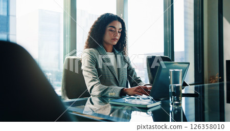 Finance, laptop and serious with business woman in office of investment firm for portfolio growth. Computer, money and typing with broker or trader in corporate workplace for planning or research Finance, laptop and serious with business woman in office of investment firm for portfolio growth. Computer, money and typing with broker or trader in corporate workplace for planning or research 126358010