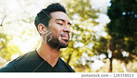 Balance, meditation and yoga with man in park for holistic exercise or wellness routine. Awareness, breathing and inner peace with yogi person outdoor in nature for fitness, mindfulness or pilates Balance, meditation and yoga with man in park for holistic exercise or wellness routine. Awareness, breathing and inner peace with yogi person outdoor in nature for fitness, mindfulness or pilates 126358023