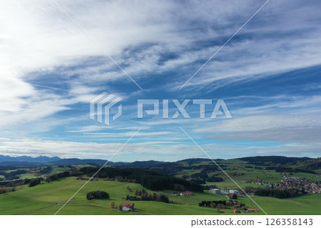 Beautiful, serene landscape with a clear blue sky and a few clouds 126358143