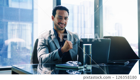 Happy, businessman and laptop with fist pump at office for winning increase, investment or profit. Man, employee or smile with computer by window for good news, promotion or bonus at workplace Happy, businessman and laptop with fist pump at office for winning increase, investment or profit. Man, employee or smile with computer by window for good news, promotion or bonus at workplace 126358180