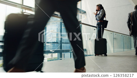 Business woman, phone call and travel with suitcase for communication, discussion or flight delay. Female person, traveler or talking with mobile smartphone for conversation, app or chat at airport Business woman, phone call and travel with suitcase for communication, discussion or flight delay. Female person, traveler or talking with mobile smartphone for conversation, app or chat at airport 126358217