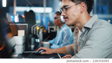 Office, businessman and reading with computer for coding, web development and scroll on website. Coworking, night and male programmer with technology for programming, software update and information 126358365
