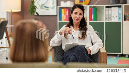 Therapist, counselling and girl in office, woman and consultation with adhd, speech therapy and conversation. Help, psychology and child development with discussion, evaluation or wellness assessment Therapist, counselling and girl in office, woman and consultation with adhd, speech therapy and conversation. Help, psychology and child development with discussion, evaluation or wellness assessment 126358445