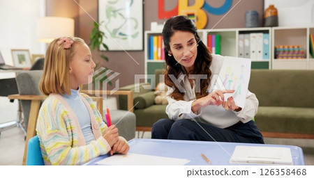 Counseling, kid and drawing with woman in psychology office for consulting, child development and art therapy. Education therapist, advice and mental health evaluation with person and girl in clinic Counseling, kid and drawing with woman in psychology office for consulting, child development and art therapy. Education therapist, advice and mental health evaluation with person and girl in clinic 126358468