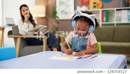 Patient, kid and drawing with woman in psychology office for consulting, child development and art therapy. Education therapist, advice and mental health evaluation with person and girl in clinic 126358527