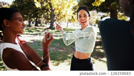 Park, smile and women stretching outdoor with friendship, talking or wellness exercise. Sport, fitness and group of female athletes with arm warm up for health activity with conversation in nature Park, smile and women stretching outdoor with friendship, talking or wellness exercise. Sport, fitness and group of female athletes with arm warm up for health activity with conversation in nature 126359083