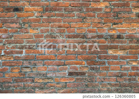 Weathered old red brick background with rough surface. 126360805