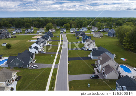 View from above of residential houses in living area in Rochester, NY. American dream homes as example of real estate development in US suburbs 126360814