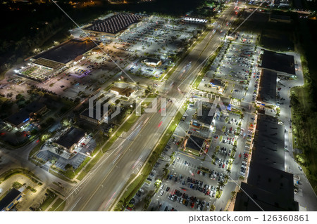 Traffic rush at shopping malls and small businesses in evening time in North Port, Florida. USA transportation and retail infrastructure concept 126360861
