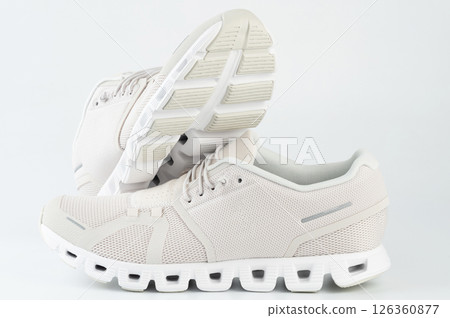 Pair of white sneaker shoes 126360877