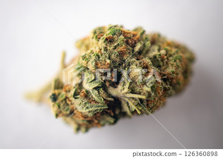 Green Dried Marijuana Buds Close Up macro. Cannabis trichomes strains. Green Dried Marijuana Buds Close Up macro. Cannabis trichomes strains. 126360898