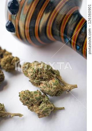 Marijuana Cannabis weed buds with pipe and grinder. 126360901