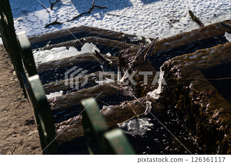 Frozen, old, Soviet waterfall, on a February morning. Looking down 126361117