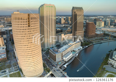 Tampa, Florida. Downtown district of American city after sunset with brightly illuminated high buildings and street traffic. USA travel destination 126361176