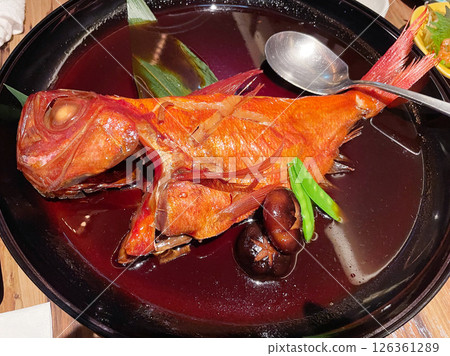 Braised whole golden snapper: A sweet and savory dish of high-grade fish. Braised whole golden snapper: A sweet and savory dish of high-grade fish. 126361289