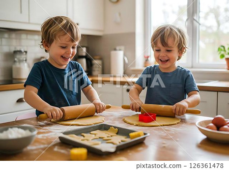 Twin Boys Baking Cookies in Kitchen 126361478