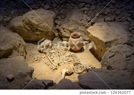 Human Skeleton and Ancient Pottery from Archaeological Site in Bahrain 126362077