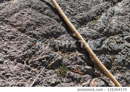 Climber's Rope Across A Positive Slope Climber's Rope Across A Positive Slope 126364570