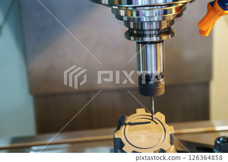 The CNC milling machine finish cut the graphite electrode parts with solid ball nose end mill tool. 126364858