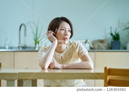 Middle-aged women feeling tired Middle-aged women feeling tired 126365092