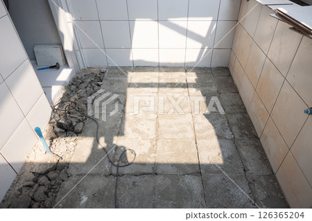 Tile and concrete floor reconstruction. Tile and concrete floor reconstruction. 126365204